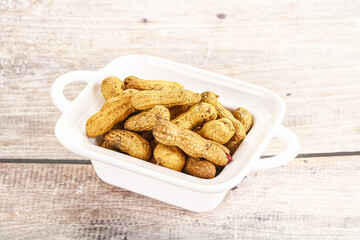 Raw ripe unpeeled peanut heap