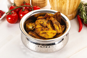 Golden baked potato Idaho with spices