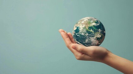 eco life concept. hand holding a planet
