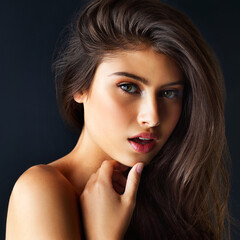 Portrait, haircare and woman with beauty, makeup and dermatology on dark studio background. Face, person and model with grooming routine, benefits and self care with keratin, texture and aesthetic