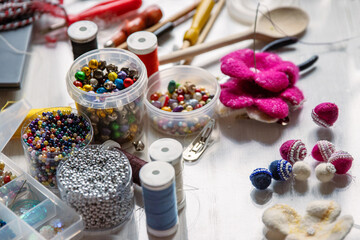Coffee stains on white wooden table. Wood texture background. Big dark brown dramatic Splatter, fleck, splash, spot, drops of black coffee. Pattern, wallpaper. Top view.  Closeup. Copy space.