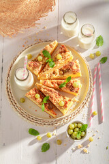 Tasty and sweet gooseberry butter cake with crumble and glaze.