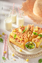 Sweet gooseberry butter cake served with milk in bottle.