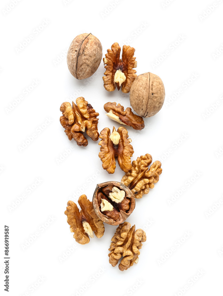 Wall mural Tasty walnuts on white background - Wall murals
