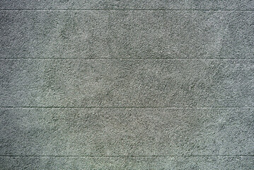 Photo of a gray concrete wall as background material