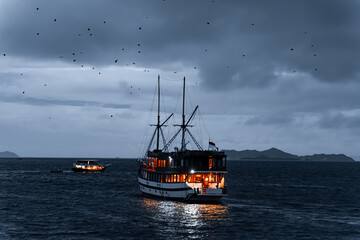 Blue hour image of live aboard boat in the komodo national park, indonesia