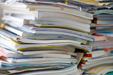 Piles of waste paper waiting to be recycled