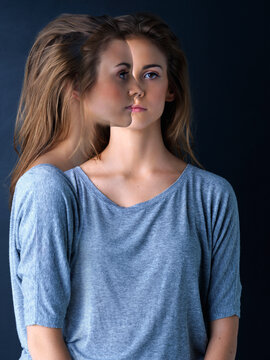 Portrait, bipolar and girl for mental health in dark background for overlay, depression or imposter syndrome. Female teenager, gen z and double exposure with anxiety disorder, illness or mood swings