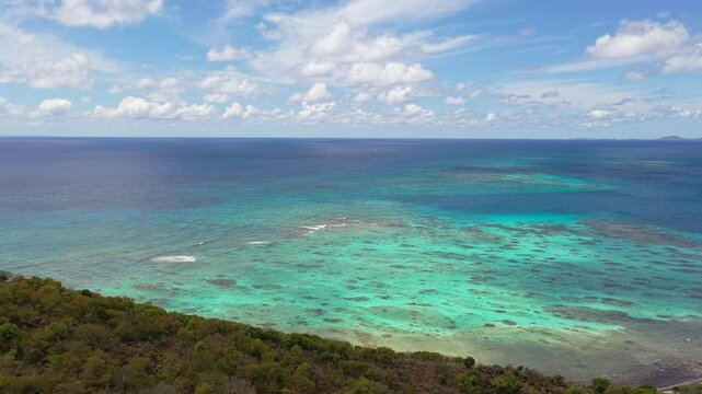 Isla Culebrita Lighthouse with the sea in the background on a sunny day in Culebra, Puerto Rico