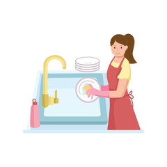 Woman washing dishes in the kitchen sink