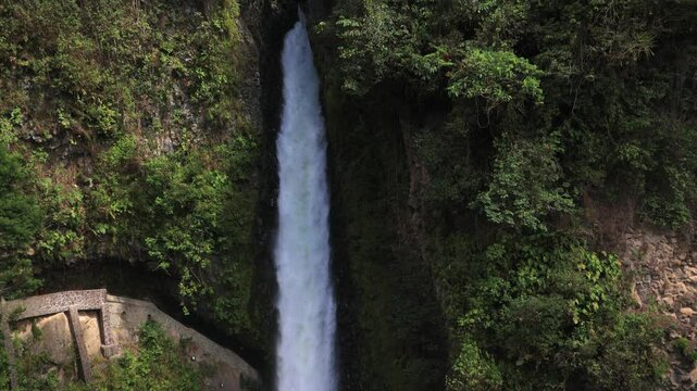 Powerful Pailon del Diablo Waterfall Cascading in Ba&ntilde;os de Agua Santa, Tungurahua, Ecuador