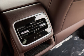 A close up of a car s rear air conditioning system