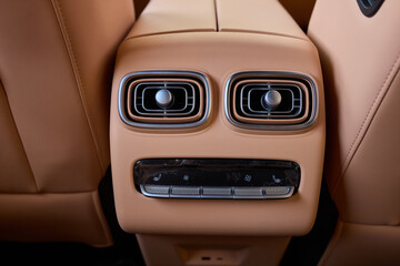 A close up of a car s rear air conditioning system