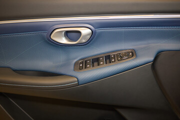 A car door with trim showcasing automotive design details