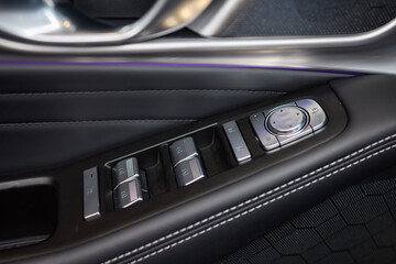 Naklejka premium A car door with trim showcasing automotive design details