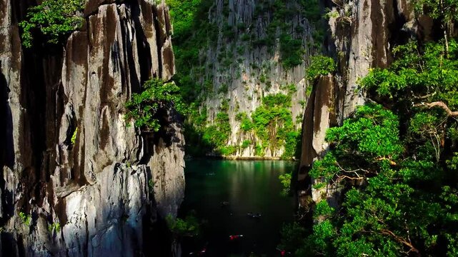 Drone footage of the Big Lagoon on a sunny day in Coron Municipality, Palawan, Philippines