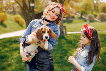 Cute and stylish family in a spring park
