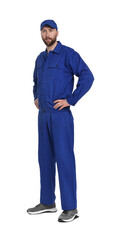 Fototapeta premium Professional auto mechanic in blue uniform on white background