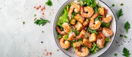 Healthy Caesar Salad with Shrimp: Top View on White Background