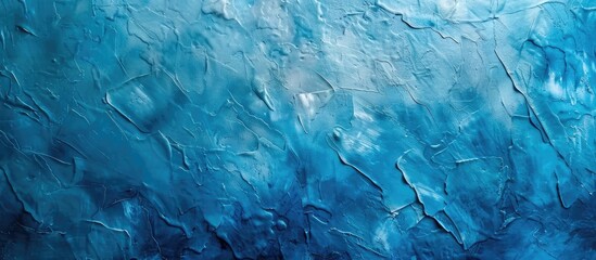 Obraz premium Blue Venetian plaster wall with decorative light paint. Abstract stucco texture and space for design. Wall decoration.