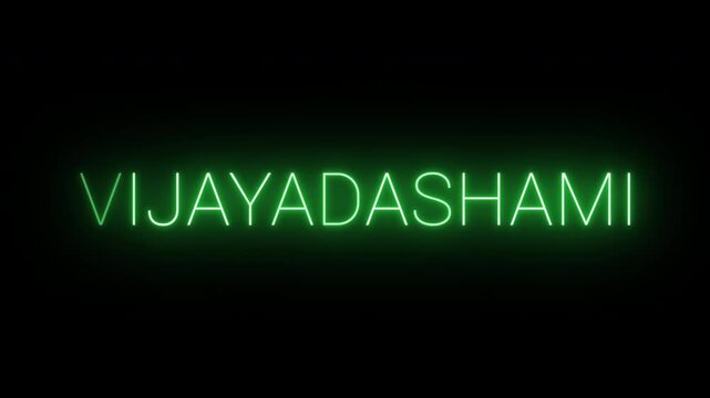 Flickering neon green glowing Vijayadashami text animated on black background