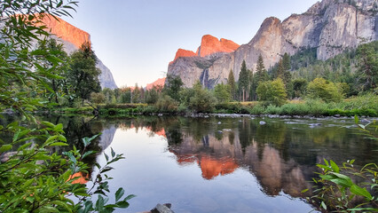 Sunset at the lake and mountains of Yosemite National Park