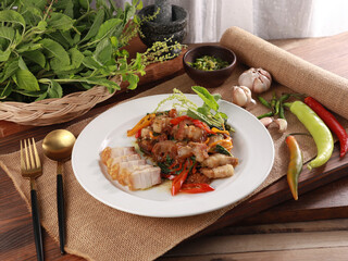 Stir-fried pork belly with basil food menu Asian food style