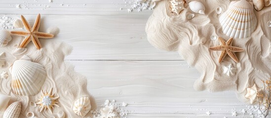 Sand on a white wooden surface with a summer theme. Overhead view with space for text.