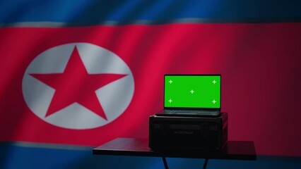 Isolated screen laptop in Pyongyang intelligence command center used by dictatorship party to run security protocols against NATO and South Korea enemies, isolated over North Korea flag, camera B - Powered by Adobe