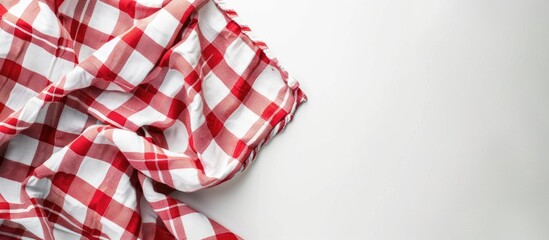 Fototapeta premium Tablecloth for kitchen. Isolated cooking towel on white background. Flat lay top view with space for text.