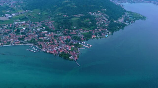 4K aerial videos of the town of Clusane located on the edge of Lake Iseo near Milan Italy taken with a drone.