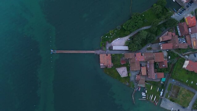 4K aerial videos of the town of Clusane located on the edge of Lake Iseo near Milan Italy taken with a drone.