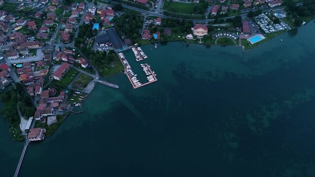 4K aerial videos of the town of Clusane located on the edge of Lake Iseo near Milan Italy taken with a drone.