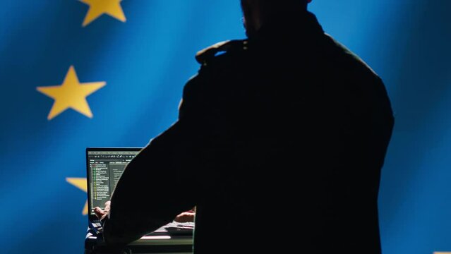 EU alliance engineer protecting against fake accounts on social media promoting totalitarian governments interests. Technician working for European Union doing cybersecurity job, camera A