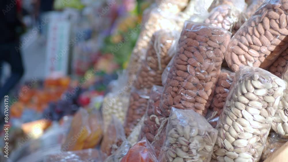 Canvas Prints many mixed nuts in a plastic packet on shelf 