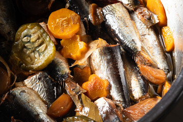 Newly cooked Spanish Sardines in a pressure cooker - A Filipino dish