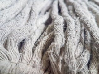 mop fibers made of cotton cloth. Mops that have been used, not new and dirty. Background and texture material.