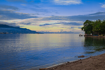 View of the sunrise on the coast of Ambon Bay, Indonesia
