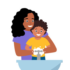 Caring mother and little son washing hands together in bathroom sink. Smiling mom help small child clean hands in bath.