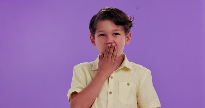 Wow, surprise and child with hand of face in studio for news, information and unexpected announcement on purple background. Shock, portrait or boy kid with emoji sign for oops, gossip or secret drama