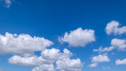 clear blue sky background,clouds with background, Blue sky background with tiny clouds. White fluffy clouds in the blue sky. 
