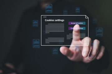 hand using computer laptop while choose to accept internet cookies policy or reject. Customer data privacy concept that allow web browser to collect user data to resell or use for marketing purpose.