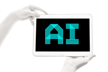 An Android robot holds a tablet in its hands. Artificial intelligence technology. AI concept