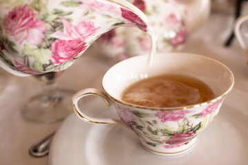 Elegant tea setting with floral teapot