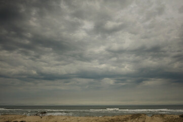 Stormy sky above dunes and ocean Outer Banks