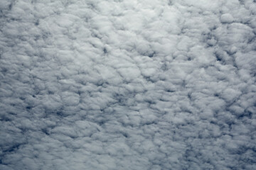 Blue sky with dense clouds