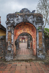 Naklejka premium Hue, Vietnam - 6 Feb, 2024: Gate arch at the Imperial Citadel, Hue, Vietnam