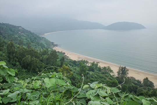 Da Nang, Vietnam - 6 Feb, 2024: Views over the tropical beaches of Nam Chon bay from the Hai Van Pass, Vietnam