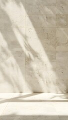 Creamy limestone wall and floor with sun rays and shadow, background for product display