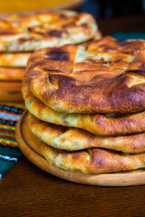 Traditional mexican pita bread on wooden table. Selective focus.
